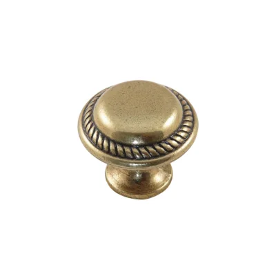 Ручка меб. кнопка мет. UNO старое золото (1 компл = 5 шт) AKS фотография